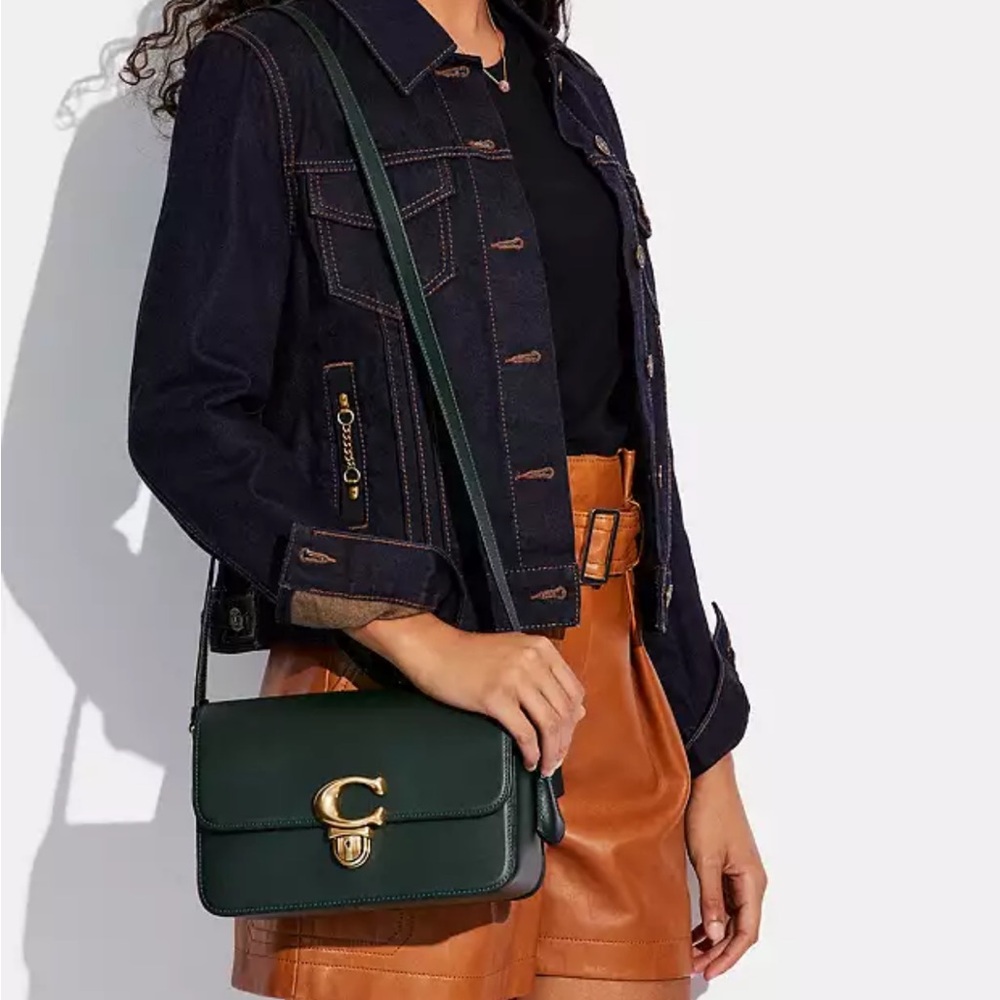 Coach Black and Gold Crossbody Bag with Elegant Hardware